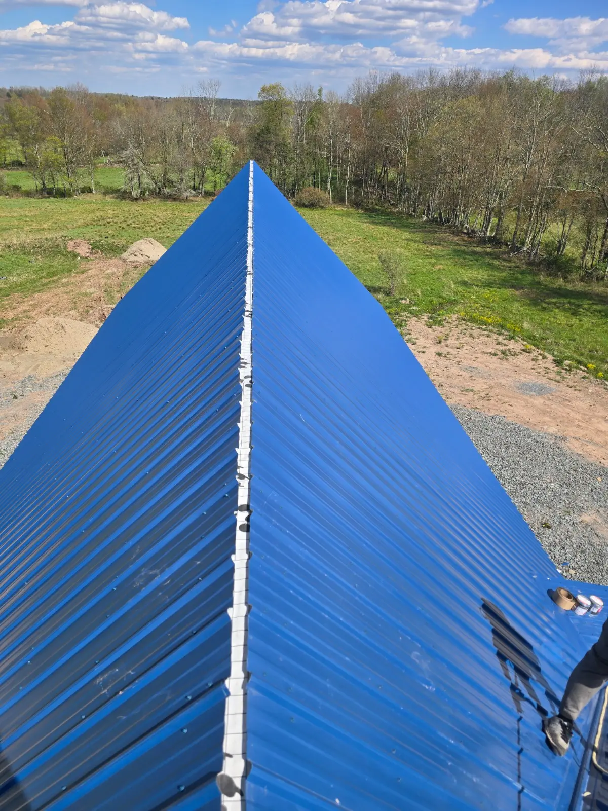 Metal roof before replacement by Eagle Sky Solutions